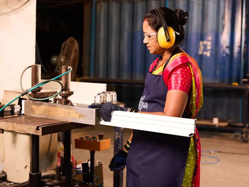 Pneumatic multi-head assembly table for hardware installation.