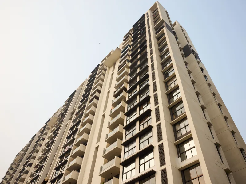 Completed high-rise township facade showing premium glazing installations.