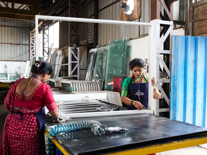 Spacious assembly bay for high-volume structural glazing panels.